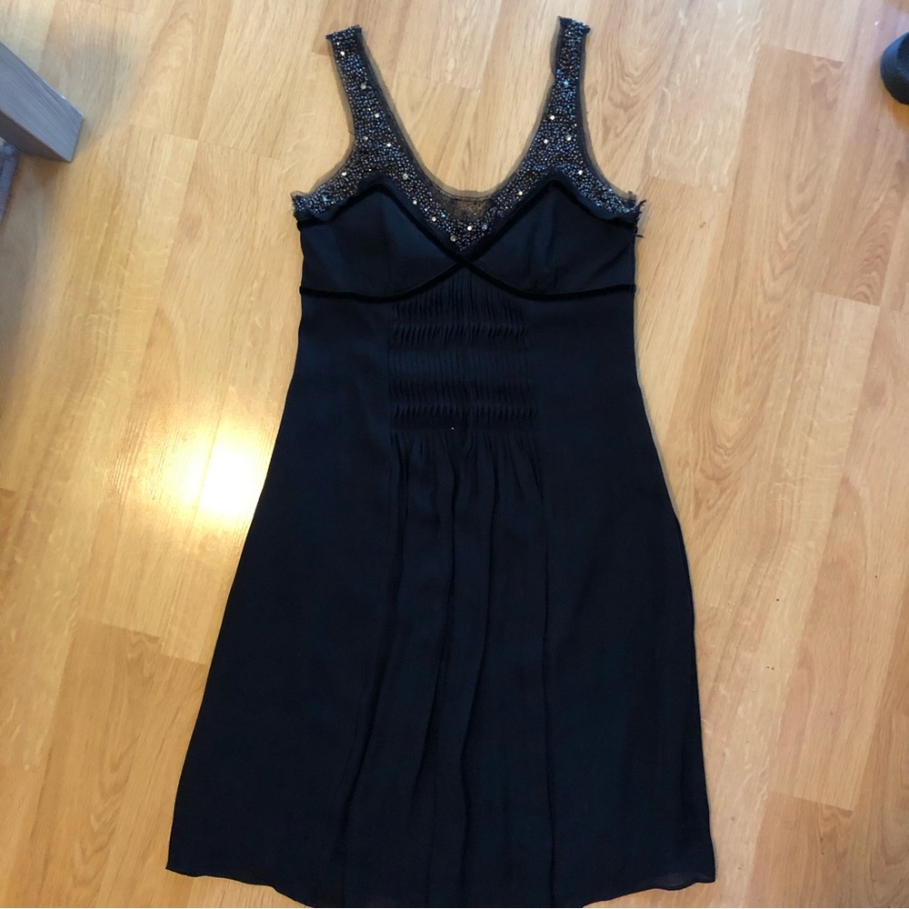 Really pretty cocktail dress. Slightly vintage. Size small.